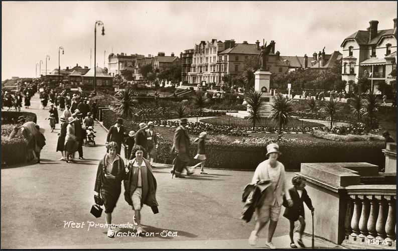 A general view showing people walking along the promenade by Clacton Seafront Gardens.
